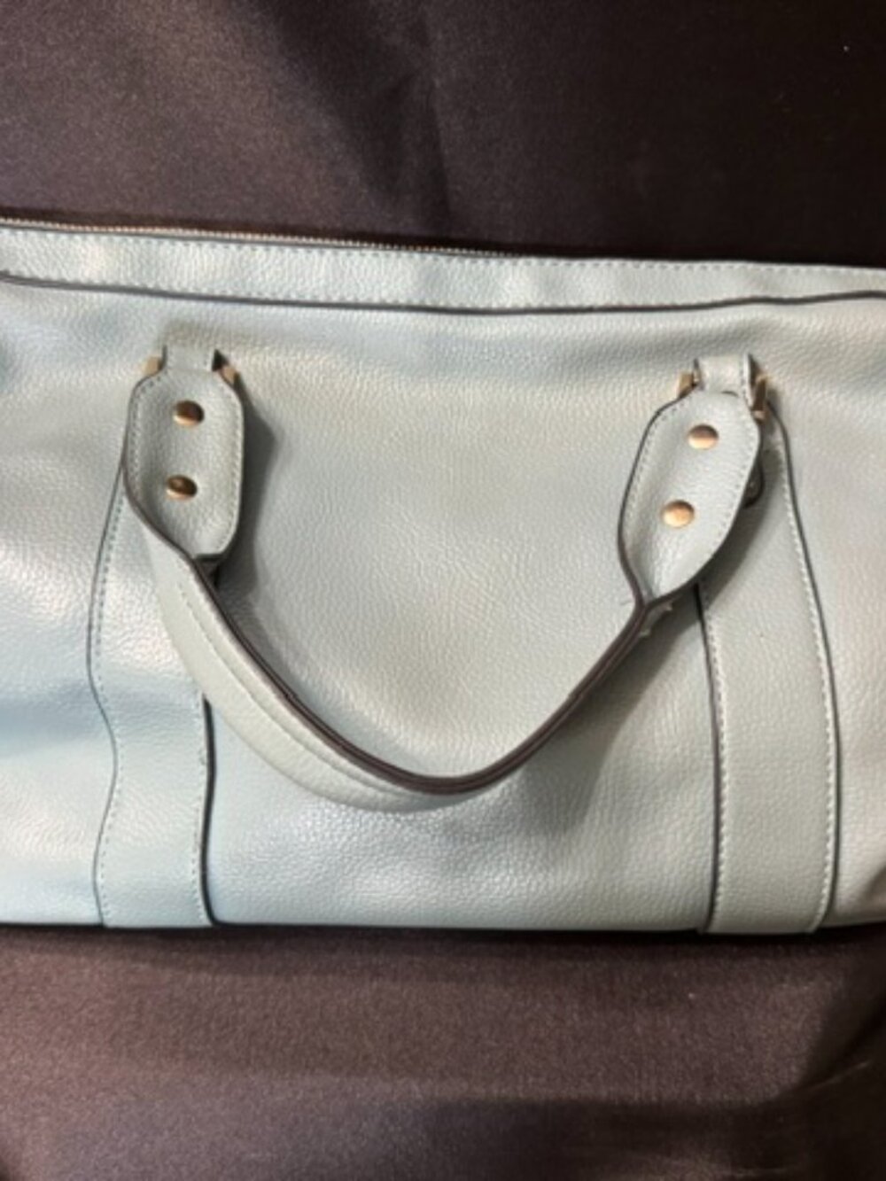Blue leather purse.